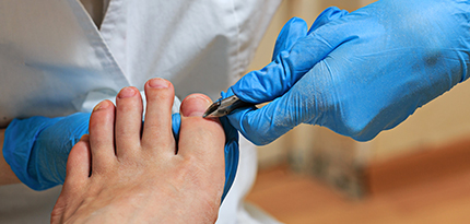Patient having treatment at podiatry clinic in Strathmore